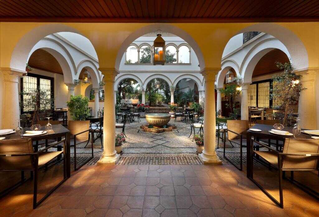 Restaurant terrace beside the Andalusian courtyard